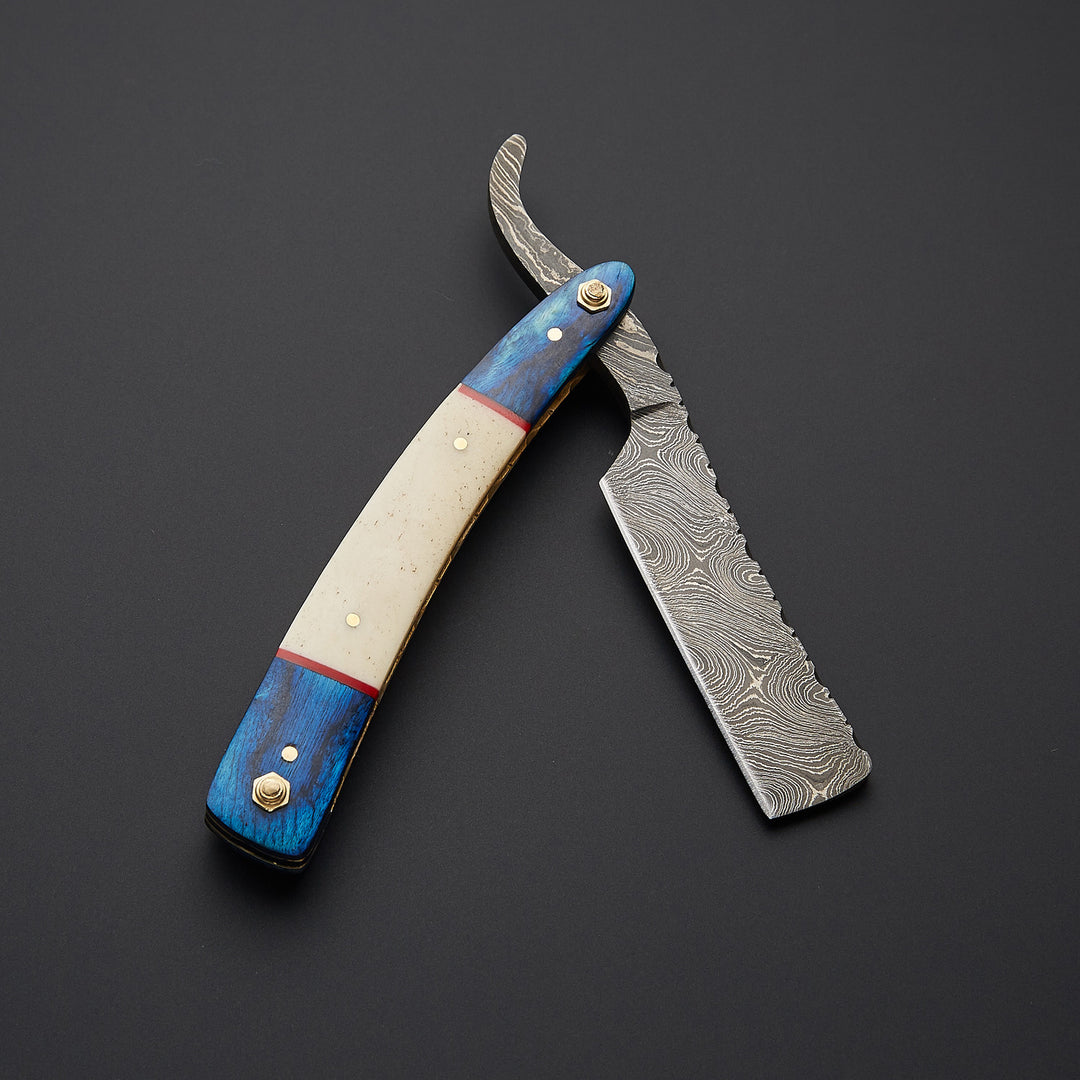 Luxury cut throat barber razor made of Damascus steel displayed with premium leather sheath for safe storage and grooming use.