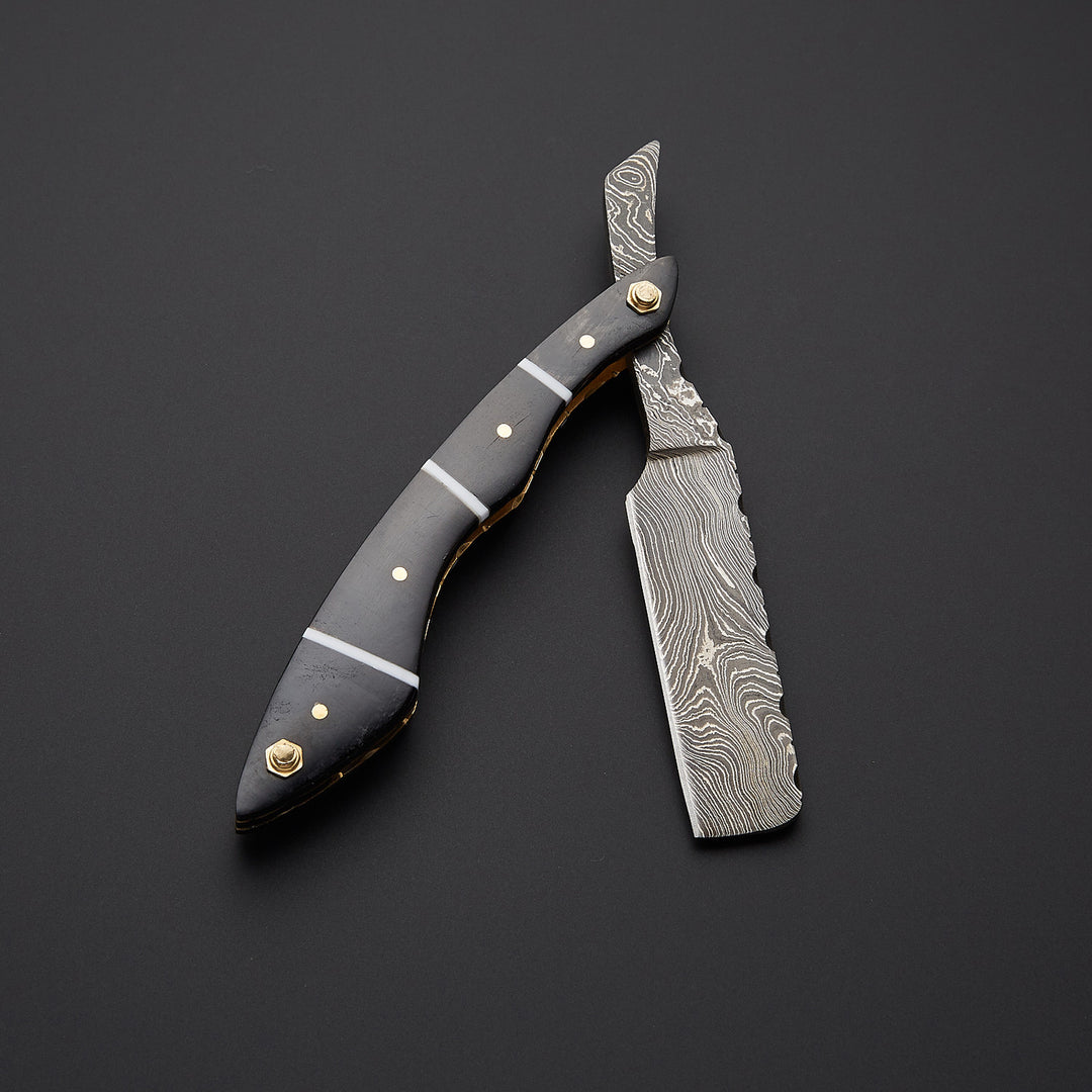 Professional barber straight razor made of Damascus steel paired with premium leather sheath for safe storage and grooming use.