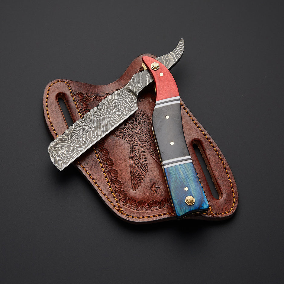 Premium handmade Damascus steel straight razor with sharp straight edge blade and finely crafted handle for professional wet shaving.