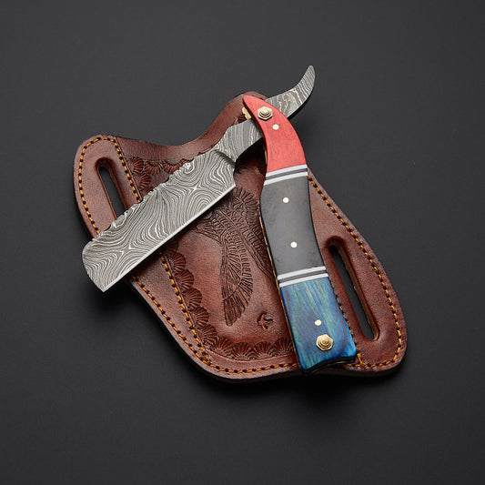 Premium handmade Damascus steel straight razor with sharp straight edge blade and finely crafted handle for professional wet shaving.