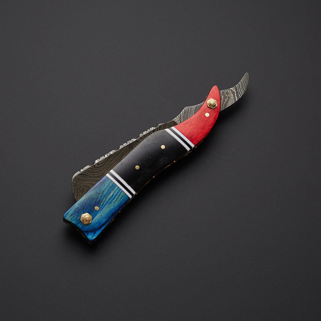 Handmade straight razor shown in open and closed positions highlighting folding design and premium craftsmanship.