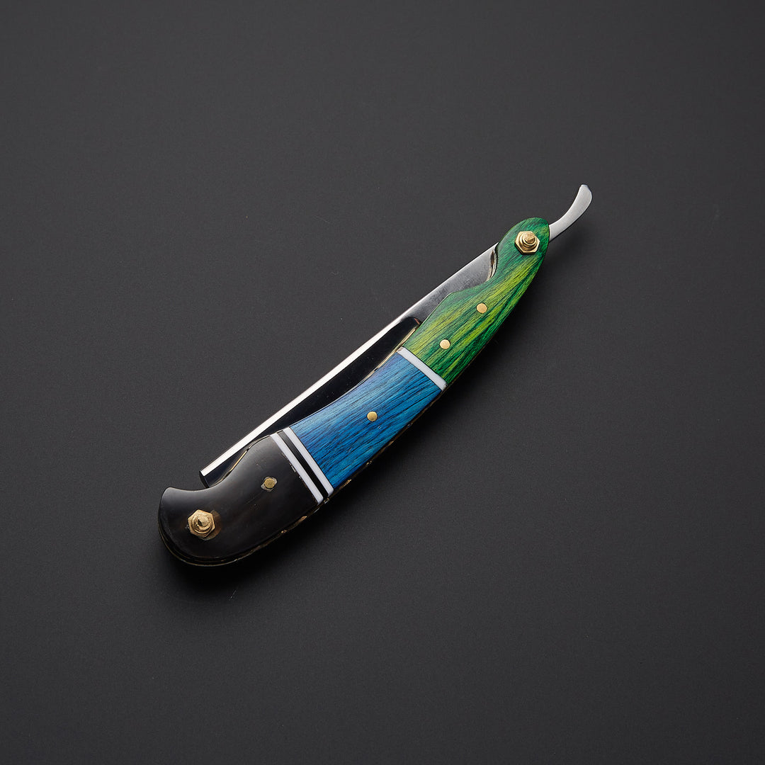Handmade J2 steel straight razor shown in open and closed positions highlighting folding design and strong metal craftsmanship.