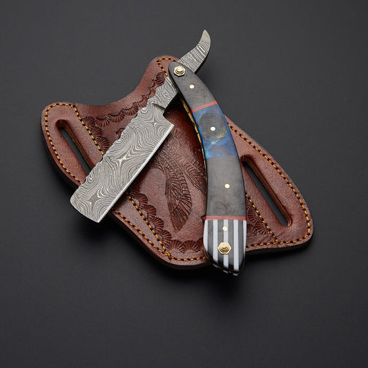 Luxury handmade Damascus steel cut throat razor with finely crafted handle and ultra-sharp blade designed for professional barber shaving.