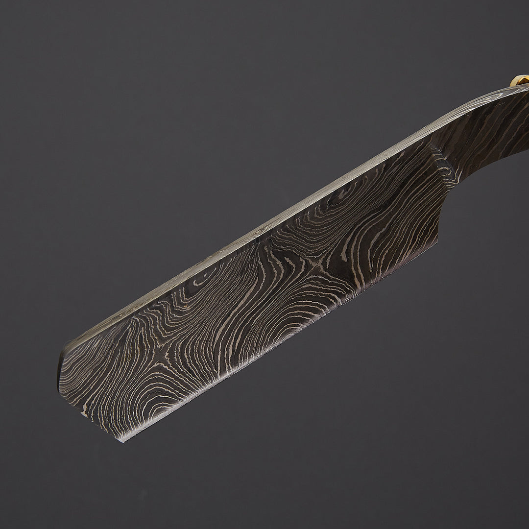 Premium Damascus steel barber cut throat razor presented in luxury gift box with leather sheath, ideal for professional wet shaving and gifting.