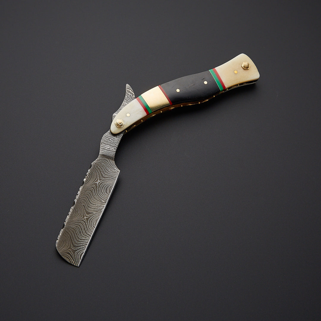 Luxury straight edge barber razor placed with high-quality leather sheath designed for safe storage and professional grooming.